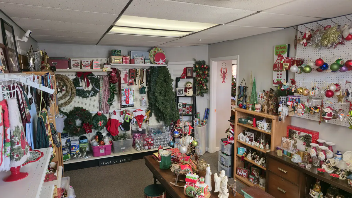 A room full of wreaths, ornaments and holiday decorations